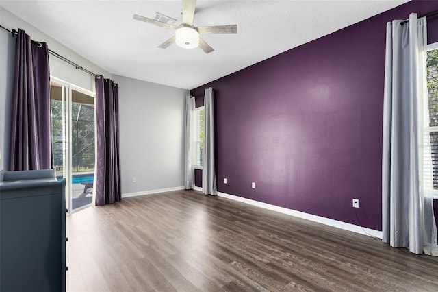 640 Brookfield Pl, Apopka, FL 32712 - empty room with baseboards, a healthy amount of sunlight, ceiling fan, and wood finished floors