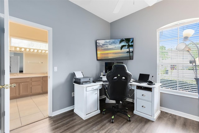 640 Brookfield Pl, Apopka, FL 32712 - office space featuring lofted ceiling, ceiling fan, a sink, and wood finished floors