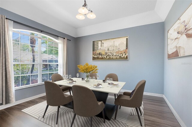 640 Brookfield Pl, Apopka, FL 32712 - dining space with a wealth of natural light, wood finished floors, baseboards, and an inviting chandelier