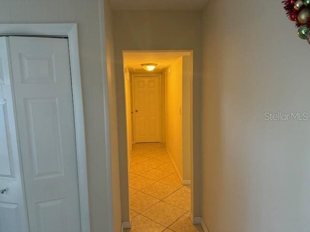 2108 Wolf Rd, Orlando, FL 32808 - corridor with light tile patterned flooring and baseboards