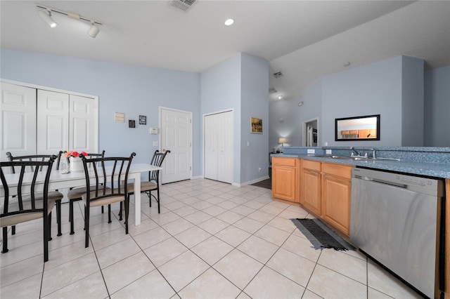 654 Chadbury Way, Kissimmee, FL 34744 - kitchen with visible vents, dishwasher, baseboards, vaulted ceiling, and light tile patterned floors