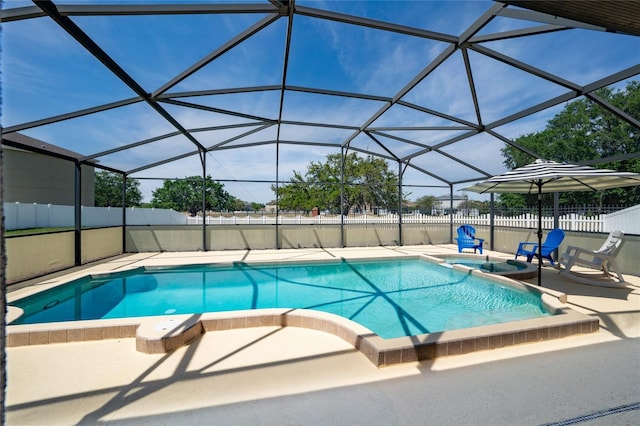 654 Chadbury Way, Kissimmee, FL 34744 - view of swimming pool featuring a fenced backyard, a pool with connected hot tub, a lanai, and a patio area