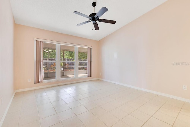 1002 Kelsey Ave, Oviedo, FL 32765 - spare room with light tile patterned floors, baseboards, vaulted ceiling, and ceiling fan