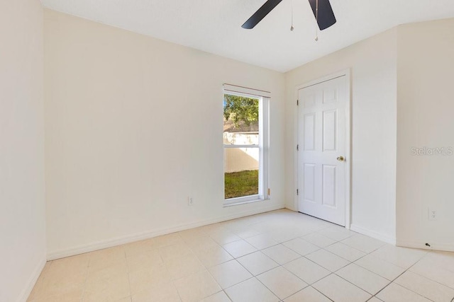 1002 Kelsey Ave, Oviedo, FL 32765 - spare room with baseboards, ceiling fan, and light tile patterned floors