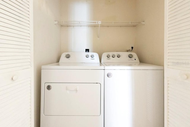 1002 Kelsey Ave, Oviedo, FL 32765 - clothes washing area featuring laundry area and separate washer and dryer