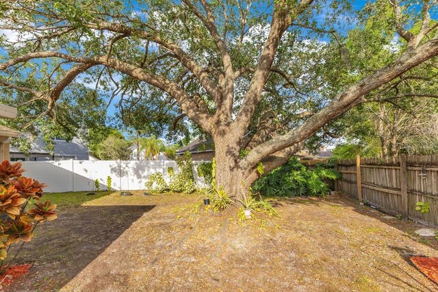 1002 Kelsey Ave, Oviedo, FL 32765 - view of yard featuring a fenced backyard