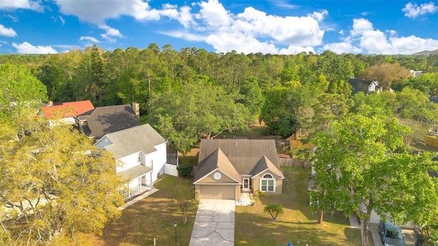1002 Kelsey Ave, Oviedo, FL 32765 - aerial view featuring a wooded view