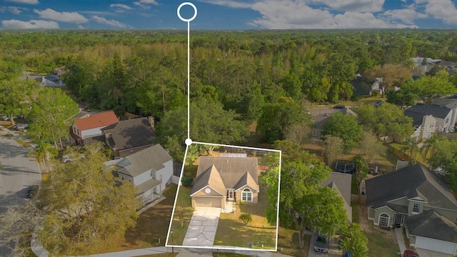 1002 Kelsey Ave, Oviedo, FL 32765 - birds eye view of property with a residential view and a view of trees