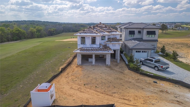 16048 Trivoli Cir, Bella Collina, FL 34756 - view of front facade featuring a tile roof, driveway, a garage, and stucco siding