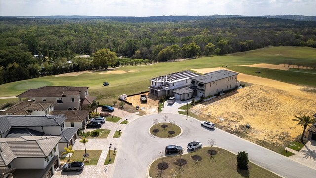 16048 Trivoli Cir, Bella Collina, FL 34756 - drone / aerial view featuring golf course view and a view of trees