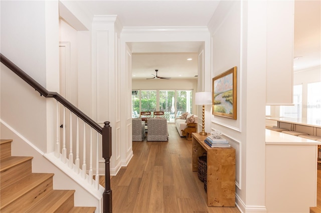 25813 Feather Ridge Ln, Sorrento, FL 32776 - foyer entrance with light wood-style flooring, a ceiling fan, stairs, and recessed lighting