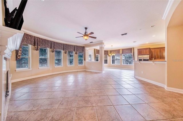 25813 Feather Ridge Ln, Sorrento, FL 32776 - unfurnished living room featuring crown molding, ceiling fan, a chandelier, baseboards, and light tile patterned floors