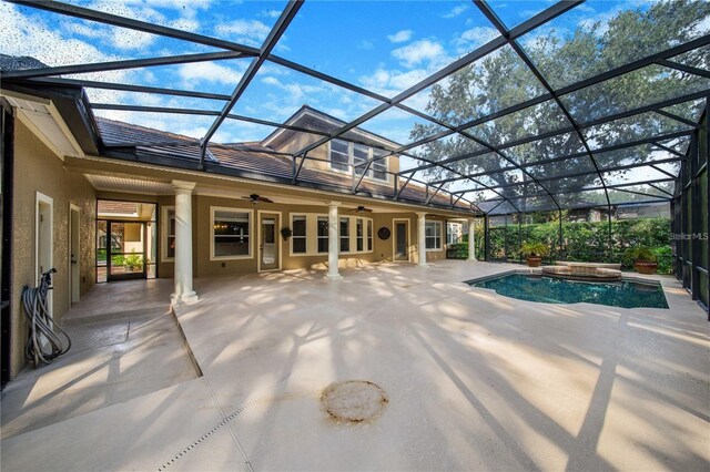 25813 Feather Ridge Ln, Sorrento, FL 32776 - rear view of property featuring a ceiling fan, a patio, stucco siding, a lanai, and a pool with connected hot tub