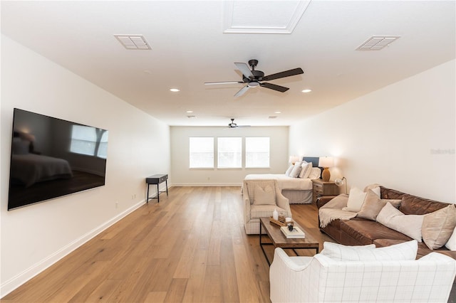 25813 Feather Ridge Ln, Sorrento, FL 32776 - living area featuring light wood-style flooring, ceiling fan, baseboards, and recessed lighting