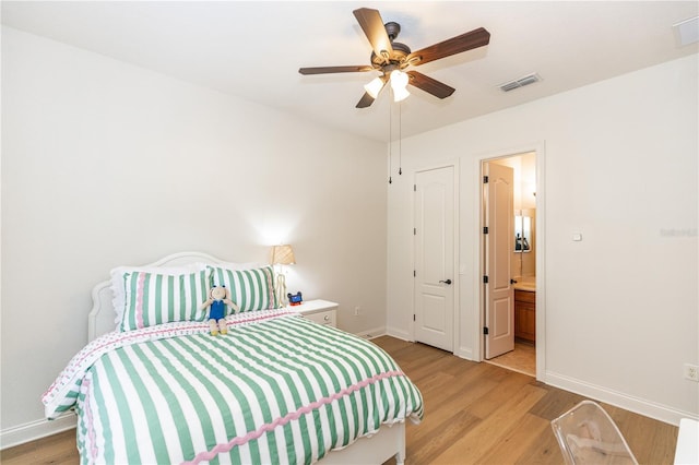 25813 Feather Ridge Ln, Sorrento, FL 32776 - bedroom featuring light wood-style flooring, a ceiling fan, and ensuite bath