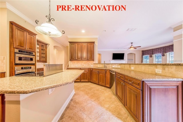 25813 Feather Ridge Ln, Sorrento, FL 32776 - kitchen with stainless steel appliances, arched walkways, decorative backsplash, light stone counters, and brown cabinets