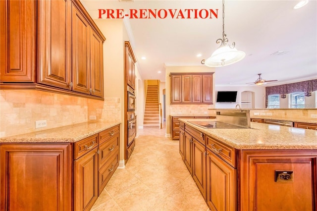 25813 Feather Ridge Ln, Sorrento, FL 32776 - kitchen with brown cabinets, stainless steel appliances, decorative backsplash, light stone counters, and ornamental molding