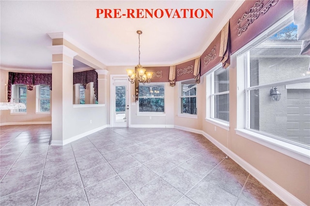 25813 Feather Ridge Ln, Sorrento, FL 32776 - unfurnished dining area with a chandelier, tile patterned floors, and ornamental molding