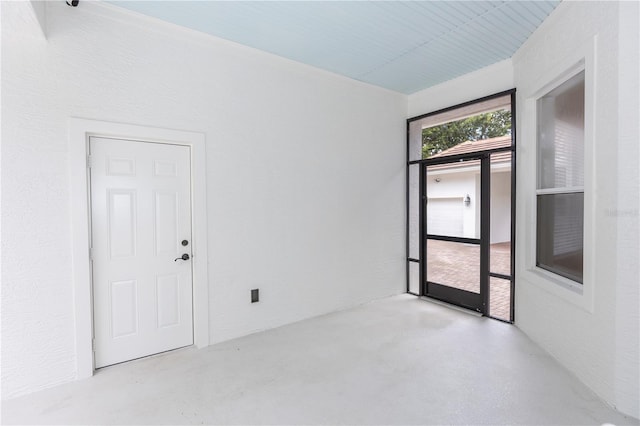 25813 Feather Ridge Ln, Sorrento, FL 32776 - empty room with concrete flooring