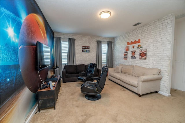 2659 Calistoga Ave, Kissimmee, FL 34741 - living room with visible vents, baseboards, carpet, and brick wall