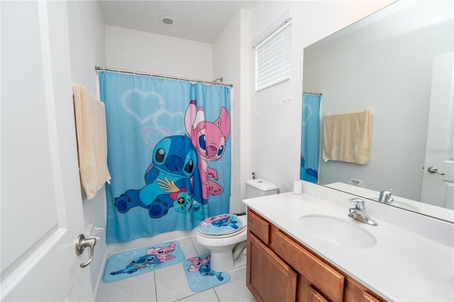 2659 Calistoga Ave, Kissimmee, FL 34741 - full bath featuring toilet, tile patterned floors, vanity, and a shower with shower curtain