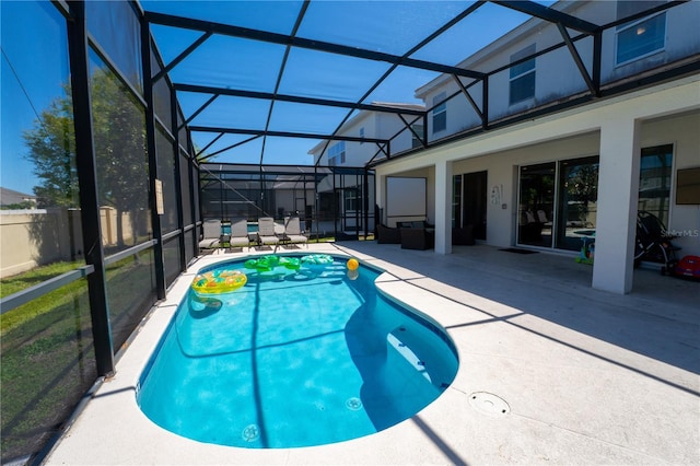 2659 Calistoga Ave, Kissimmee, FL 34741 - view of swimming pool with fence, glass enclosure, a fenced in pool, and a patio
