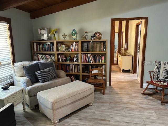 1500 Markham Woods Rd, Longwood, FL 32779 - sitting room with beamed ceiling and wooden ceiling