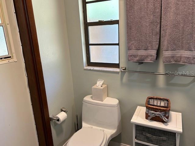 1500 Markham Woods Rd, Longwood, FL 32779 - bathroom featuring a wealth of natural light and toilet