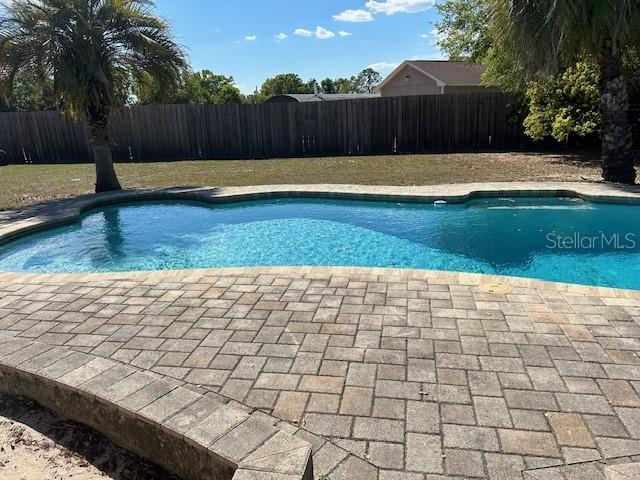 1500 Markham Woods Rd, Longwood, FL 32779 - view of swimming pool with a fenced in pool and a fenced backyard