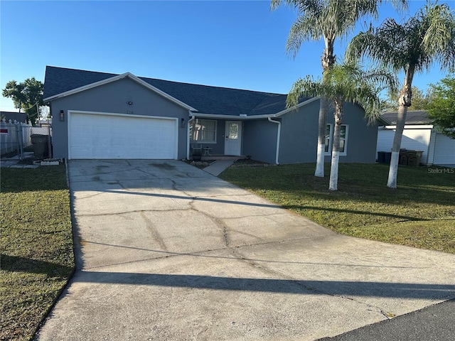 214 Magellan Dr, Kissimmee, FL 34758 - single story home featuring a front lawn, driveway, stucco siding, and a garage
