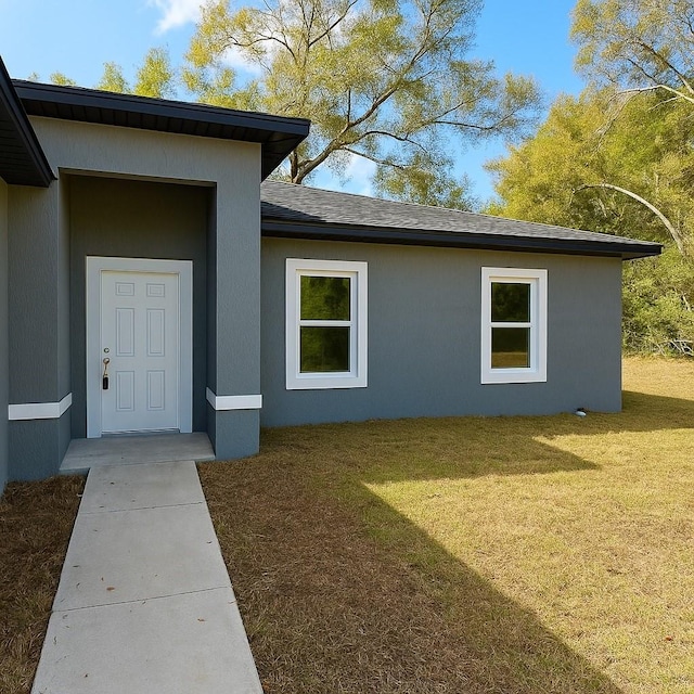 8830 N Salina Dr, Citrus Springs, FL 34434 - entrance to property with a yard and a shingled roof