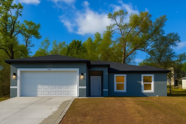 8830 N Salina Dr, Citrus Springs, FL 34434 - prairie-style home with concrete driveway, stucco siding, a garage, and a front yard