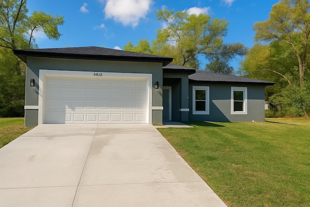 8830 N Salina Dr, Citrus Springs, FL 34434 - view of front of property featuring stucco siding, driveway, a front yard, and an attached garage