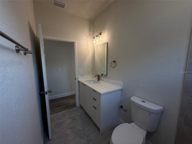 8830 N Salina Dr, Citrus Springs, FL 34434 - bathroom with vanity and a textured wall