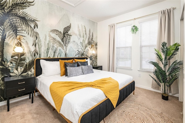 bedroom with baseboards and carpet floors