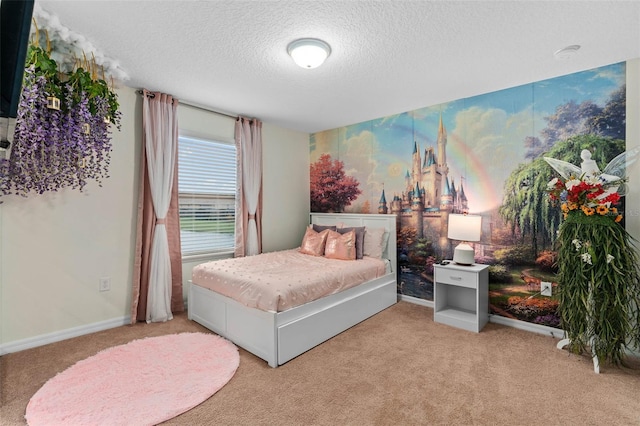 carpeted bedroom featuring baseboards, a textured ceiling, and wallpapered walls