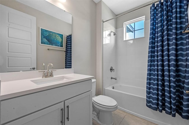 2011 Soaring Oak Way, Winter Park, FL 32792 - bathroom featuring toilet, tile patterned floors, vanity, and shower / bathtub combination with curtain