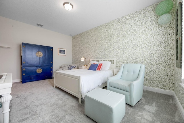 2011 Soaring Oak Way, Winter Park, FL 32792 - carpeted bedroom with wallpapered walls, visible vents, and baseboards