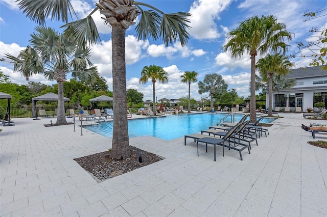 2011 Soaring Oak Way, Winter Park, FL 32792 - pool with a gazebo, fence, and a patio area