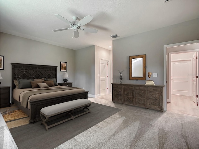 509 Mulberry St, Fruitland Park, FL 34731 - bedroom with ceiling fan, baseboards, light colored carpet, and visible vents