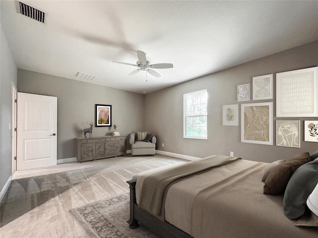 509 Mulberry St, Fruitland Park, FL 34731 - bedroom with baseboards, carpet floors, ceiling fan, and visible vents