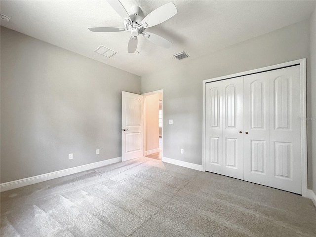 509 Mulberry St, Fruitland Park, FL 34731 - unfurnished bedroom with a closet, visible vents, carpet, baseboards, and a ceiling fan