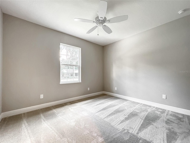 509 Mulberry St, Fruitland Park, FL 34731 - spare room featuring baseboards, ceiling fan, and carpet flooring