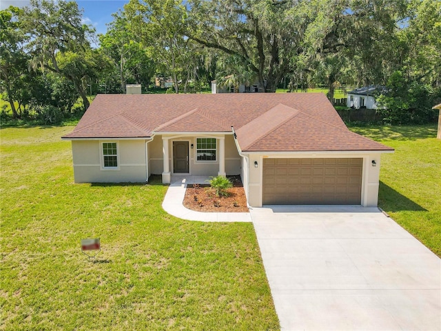 509 Mulberry St, Fruitland Park, FL 34731 - single story home with a front yard, stucco siding, and a garage
