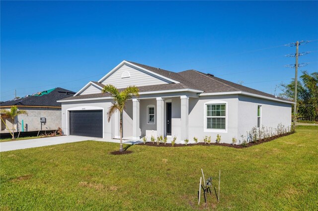 25372 Alicante Dr, Punta Gorda, FL 33955 - view of front facade featuring a garage, a shingled roof, driveway, and a front lawn