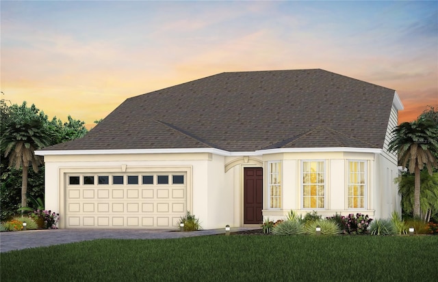 15446 Orchard Garden St, Winter Garden, FL 34787 - view of front of house with an attached garage, a front lawn, roof with shingles, and decorative driveway