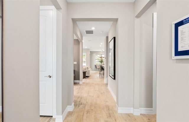 15446 Orchard Garden St, Winter Garden, FL 34787 - corridor with light wood finished floors, baseboards, visible vents, and recessed lighting