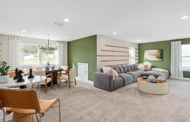 15446 Orchard Garden St, Winter Garden, FL 34787 - carpeted living room with plenty of natural light, visible vents, and recessed lighting