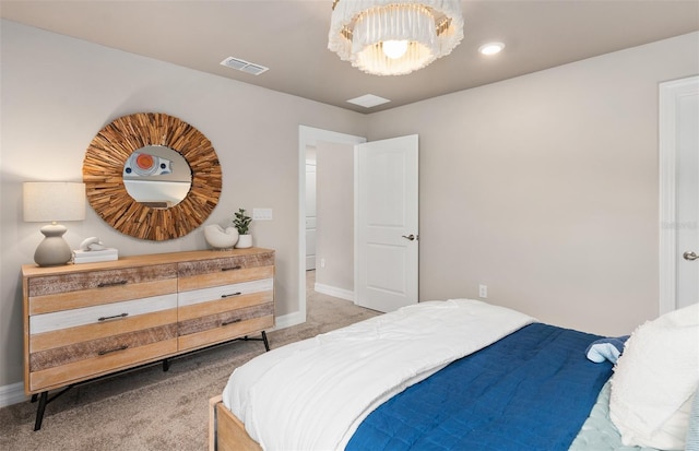 15446 Orchard Garden St, Winter Garden, FL 34787 - bedroom featuring baseboards, visible vents, an inviting chandelier, and light colored carpet