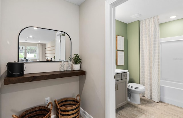 15446 Orchard Garden St, Winter Garden, FL 34787 - full bath with toilet, vanity, shower / bath combo, and wood finished floors